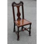 An early 18th century mahogany side chair, circa 1720, probably Dutch, the back with a shaped and