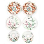 A collection of Chinese famille rose bowls and dishes, decorated with blossom, others with bats and