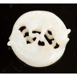 A white jade carving of two cats, intert