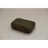 A carved jade box, moss textured, rectan