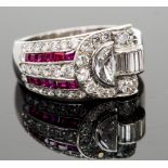 An Art Deco style platinum, diamond and ruby ring, set with round brilliant, baguette and semi-