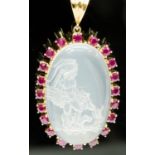 A moonstone intaglio pendant, the oval cabachon carved with a classical figure and two dogs approx