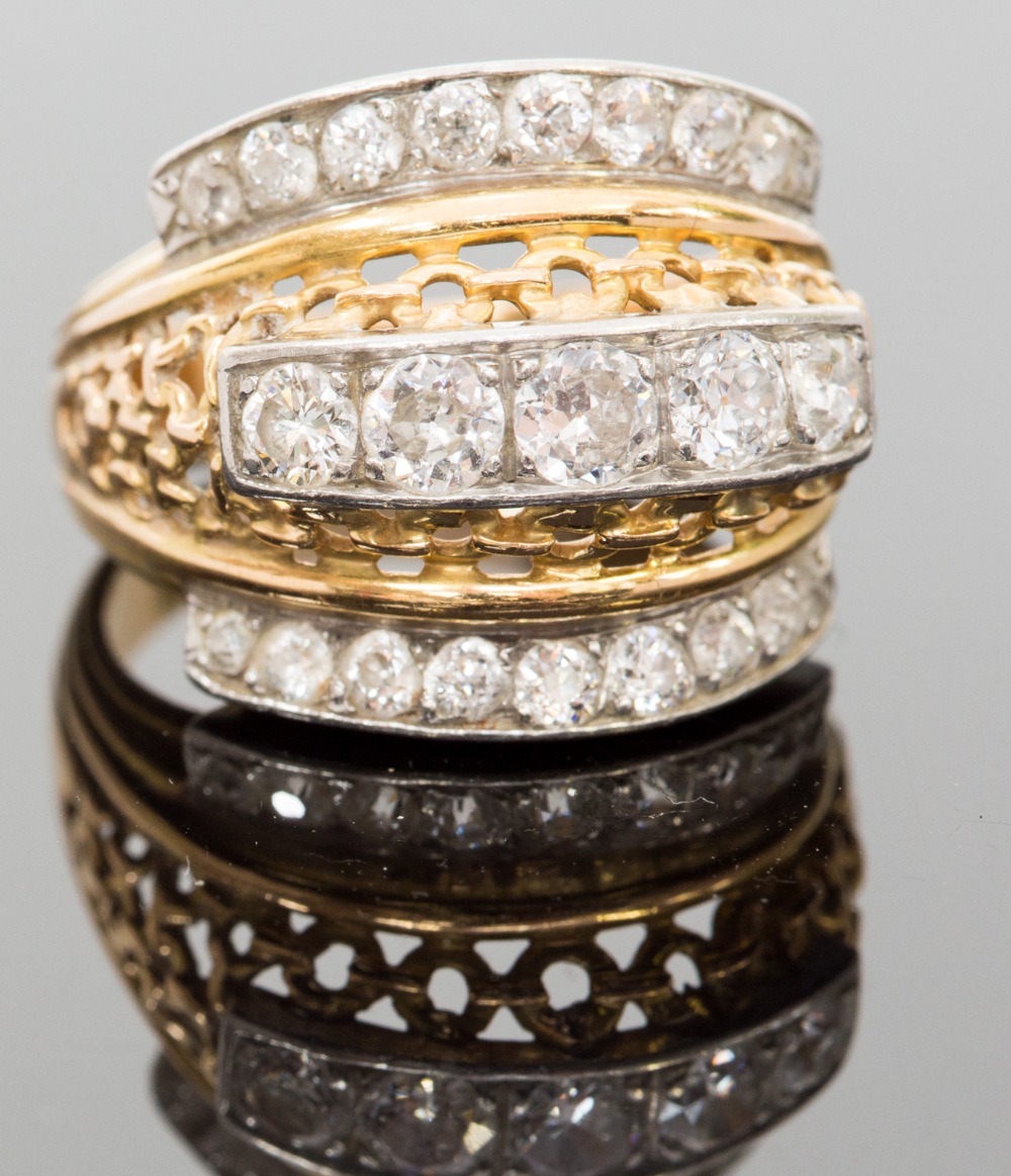 **VENDOR WITHDRAWN** An 18ct gold and diamond ring, set with five round-cut stones in a pierced