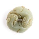 A carved jade pendant disc of two cats e