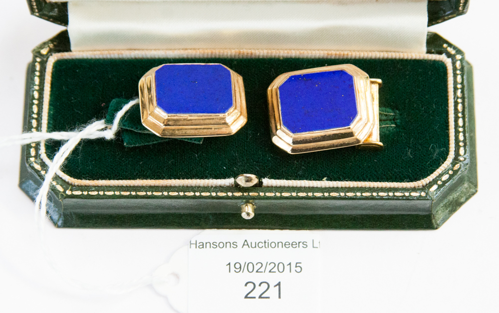 A pair of 18ct gold and lapis lazuli cufflinks, set with a canted rectangular stone in a stepped