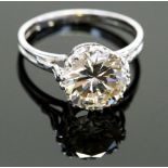 An impressive diamond solitaire ring, set with a round brilliant-cut diamond, ring size S, tests as