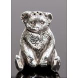 An Edwardian silver novelty pepperette cast in the form of a teddy bear, Joseph Gloster Ltd,