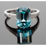 An 18ct white gold, zircon and diamond ring, set with a step-cut blue zircon approx 5.24cts,