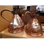 Two graduated 19th Century copper haystack measures (2)