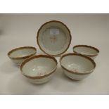 Four late 18Century Chinese export tea bowls together with one sauce, ogee rims,