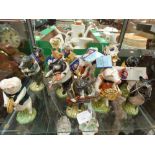 **REOFFER IN MAY £200 - £300** A boxed set of fifteen Beswick pig band members