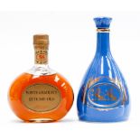 Whyte and Mackay's 21 year old whisky together with another Whyte and Mackay blue ceramic decanter