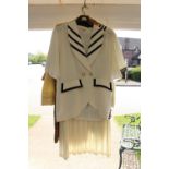 Skirt suit 1990's in gold/beige, diagonal stripes and a Coast cream trouser suit with a floral