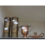 A pair of Trench Art shell vases, with repousse floral decoration,