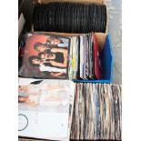 A collection of 400 by seven inch singles from the 80s, including Queen, The Smiths, etc (three