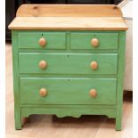 A pine chest of drawers, fitted with two short drawers over two long drawers