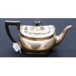 A George V silver teapot, in the Regency style, having an ebony finial to lid and a Bakelite