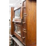 A George III style oak double door bookcase top and a wall hanging set of shelves, standard lamp