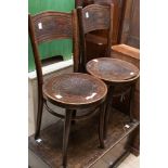 A pair of early 20th century Bentwood chairs, together with an Edwardian mahogany two-tier plant