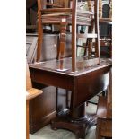 A Victorian mahogany sutherland table; with Victorian side chairs and a pine Victorian fireside