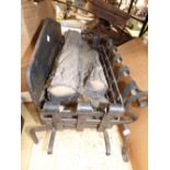 A craftsman made Barry Potter of Brailsford Forge, wrought iron fire grate with back plate and fire