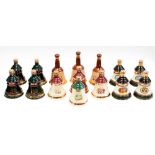 A large collection of Bells decanters including Christmas 1988-1998 inclusive, together with Old