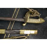 A Royal Naval officer sword and belt and hangers. World War 1 in date