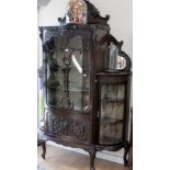 A late Victorian Aesthetic ebonised display cabinet, circa 1890