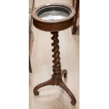 An early Victorian rosewood tripod stand, circa 1850, possibly the base of a teapoy, converted in