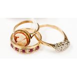 Three 9ct  gold ladies rings, comprising of ruby and diamond ring, a cameo ring and one illusion
