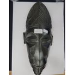 African ebony mask, wall hanging