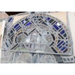 A series of stained glass windows (rescued from a Stoke Church) slight damage and in need of
