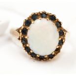 **RE-OFFER MAY 100/150**An opal and sapphire ring,