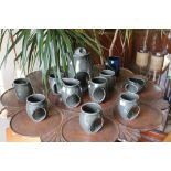 A Holkham late 20th Century coffee set, in teal, comprising coffee pot, six coffee mugs, milk jug,