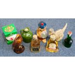Miniature Whiskies, eight decorative bottles, some by Beswick