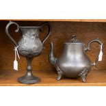 A Victorian Brittania metal teapot and a Britannia metal trophy (twin handles) (2)