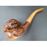 A burr wood and fruitwood carved pipe