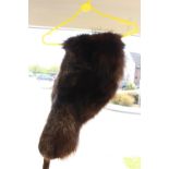 A 1930's fur Stole in good condition with Fox's head in the centre (unusual design)