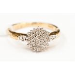 **RE-OFFER MAY 100/150**A 9ct  diamond cluster ring, approx 25 pts,