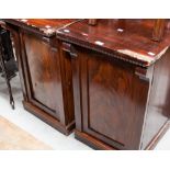 A pair of early Victorian mahogany pedestal cabinets