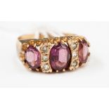 **RE-OFFER MAY 60/80**A 9ct three stone amethyst ring