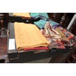 A large box of remnants to consist of purple and jade pleated fabric, mustard check, floral velvet