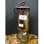A miners lamp by The Protector Lamp of Lighting Co Ltd, Eccles, type SL, approval No B/120 (1)