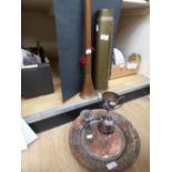 Two shell cases, a North African copper wall plaque, copper post horn and Swedish blow lamp and