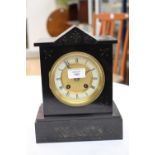 A Victorian slate mantle clock Roman numerals on brass dial possibly French mechanism - working-