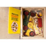 A selection of Meccano highway components in a wooden box