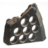 A slate wine rack for eight bottles