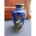 A Japanese cloisonné vase decorated with a dragonfly approx 12cm high