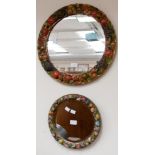 Two Barbola type circular wall mirrors, the gilt and painted surrounds with fruit and flowers,