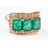 **RE-OFFER - MAY 250/350**An emerald and diamond ring,